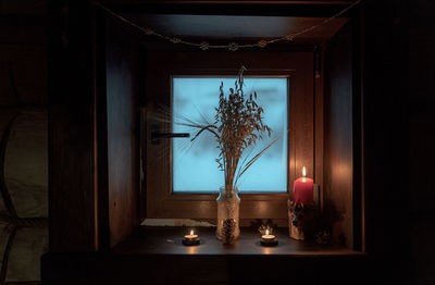 Flower vase on table at home