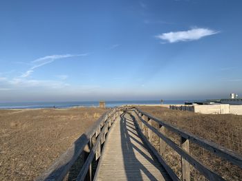 Scenic view of sea against blue sky