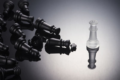 Close-up of chess pieces on table