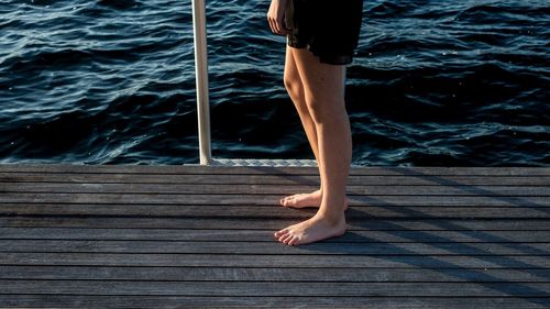 Low section of woman in swimming pool