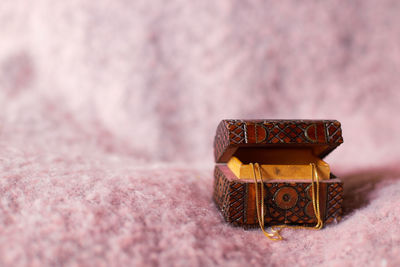 Close-up of pink box on table