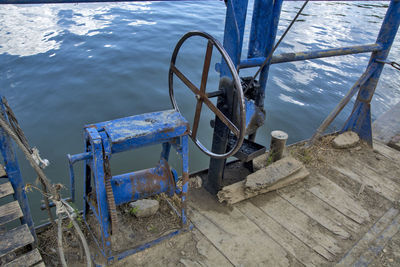 High angle view of ladder by sea