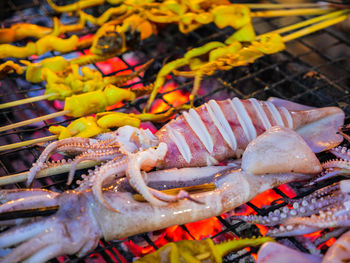 Close-up of fish on barbecue
