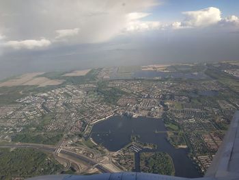 Aerial view of city against sky
