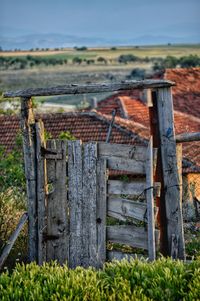 Old wooden fence on field