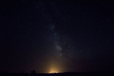 Low angle view of stars in sky at night