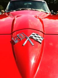 Close-up of red vintage car