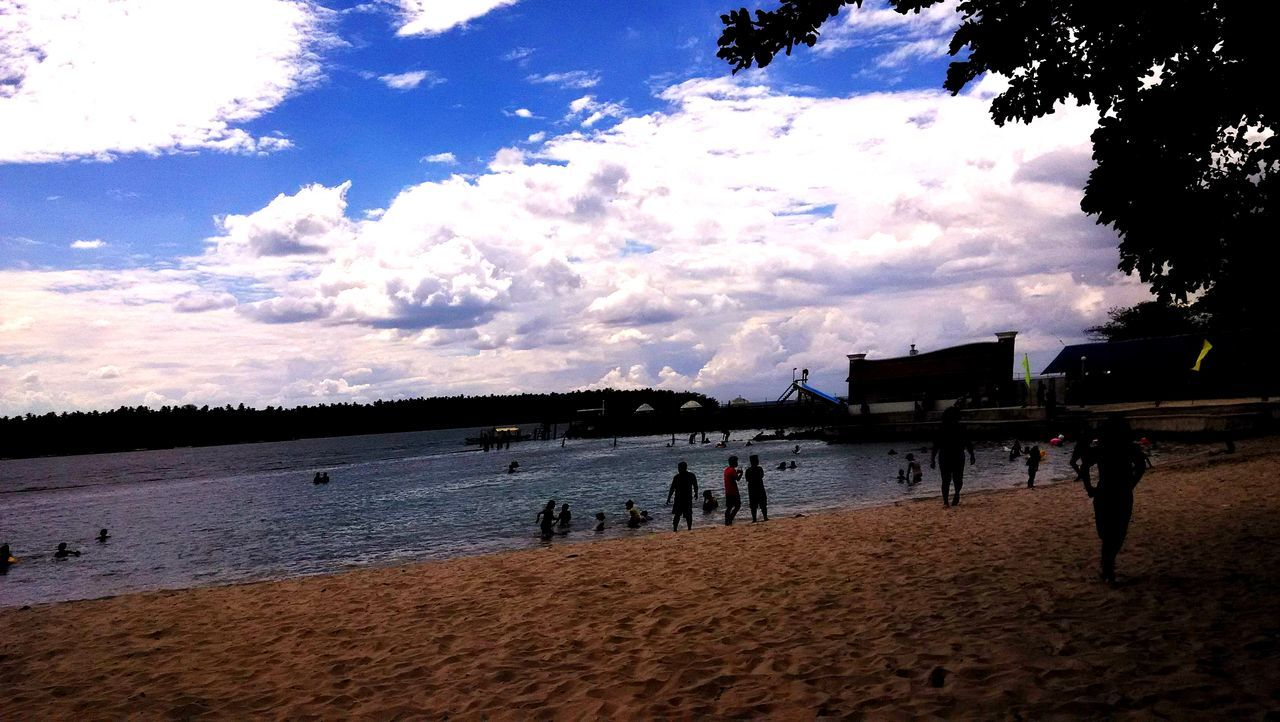 beach, water, sky, large group of people, lifestyles, leisure activity, sea, shore, cloud - sky, person, men, mixed age range, vacations, scenics, sand, beauty in nature, nature, tranquil scene, tranquility