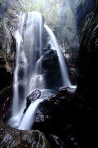 View of waterfall in forest