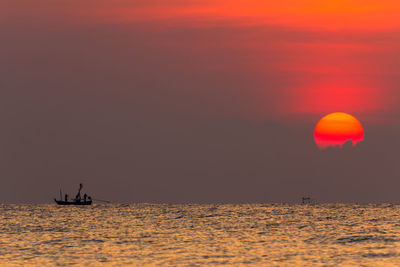 Sunset over sea majestic clouds in the sky