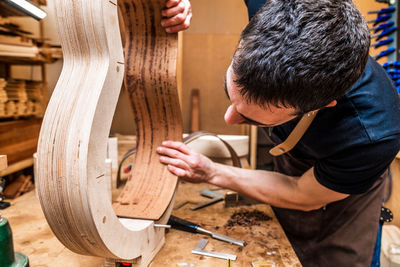 Man working on wood