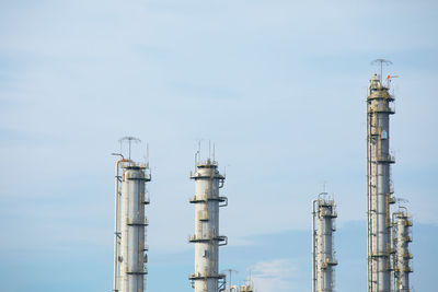 Low angle view of factory against sky