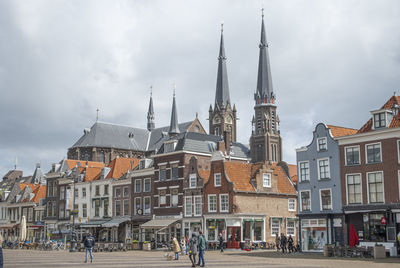 View of buildings against sky in city