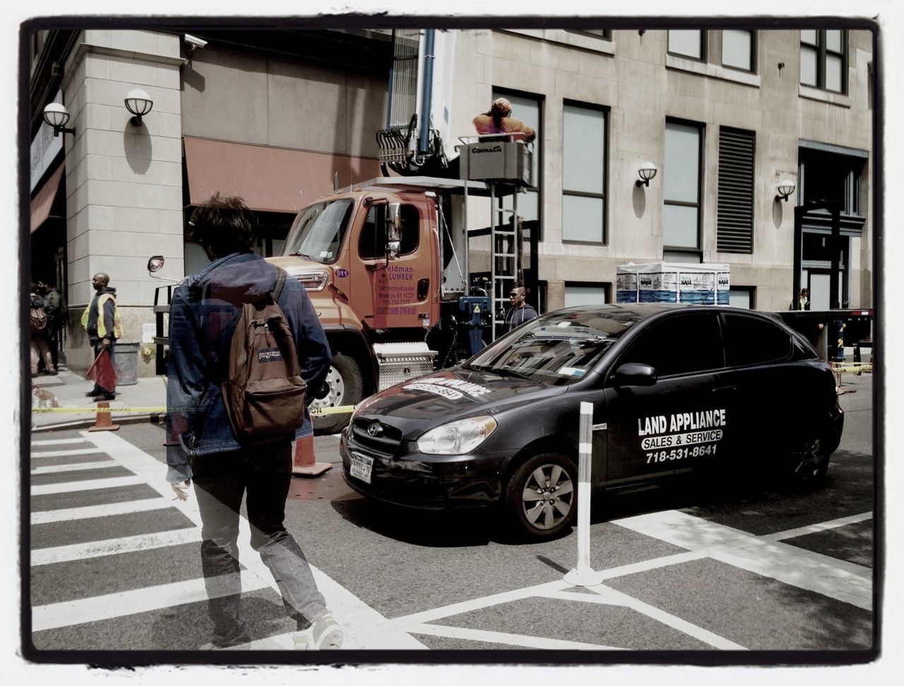 transportation, transfer print, building exterior, land vehicle, mode of transport, architecture, car, street, built structure, auto post production filter, men, city, full length, road, rear view, city life, day, walking