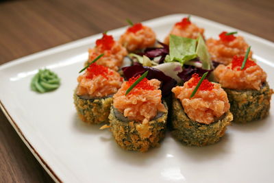 Close-up of sushi served in plate