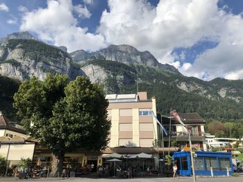 Houses and buildings against sky