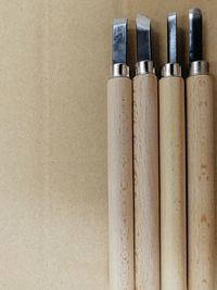 Directly above shot of chisels on table