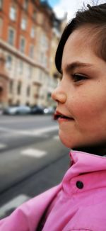 Close-up portrait of girl looking away