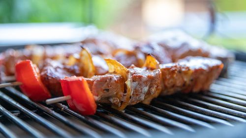 Close-up of meat on barbecue grill