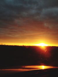 Scenic view of dramatic sky during sunset