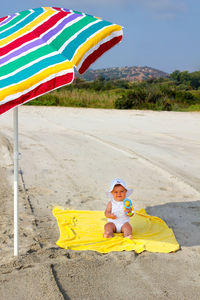 Full length of boy on beach