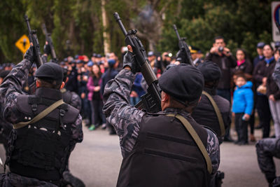 Army soldiers with rifle in parade