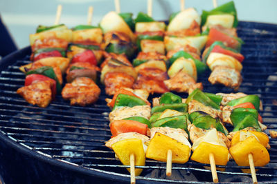 Close-up of meat on barbecue grill