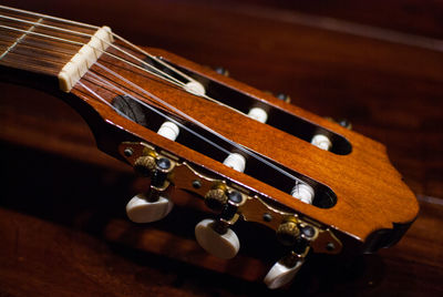 High angle view of guitar on table