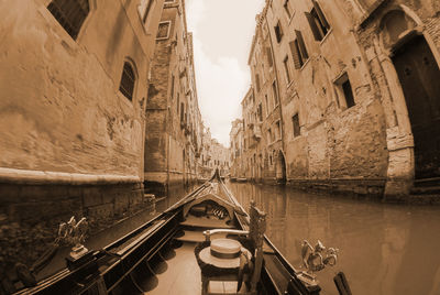 Canal passing through city buildings