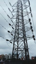 Low angle view of electricity pylon