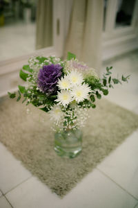 Close-up of flower vase on table