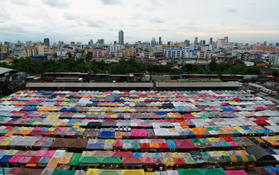 High angle view of multi colored buildings in city