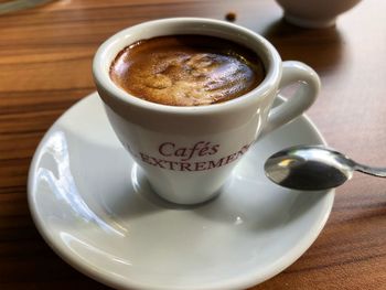 Close-up of coffee cup on table