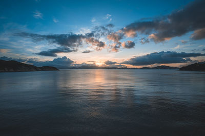 Scenic view of sea against sky during sunrise