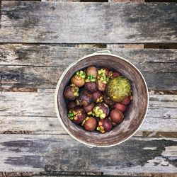 High angle view of fruits in bowl on table