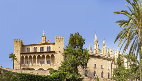 Low angle view of historic building against clear sky