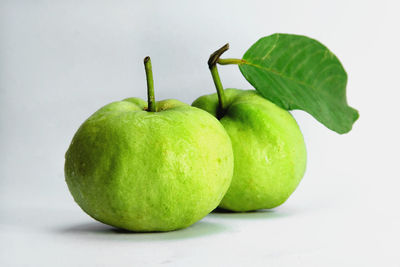 Close-up of apple against white background