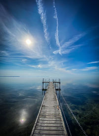 Scenic view of pier against sky