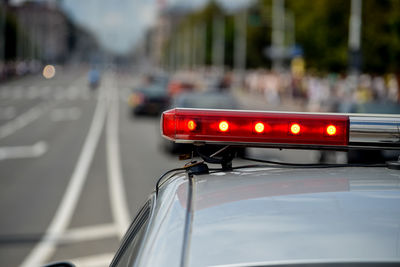 Close-up of traffic on road in city