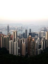 Aerial view of modern buildings in city against sky