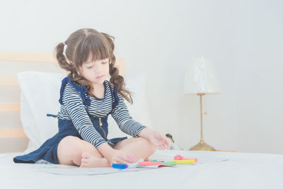 Cute girl sitting at home