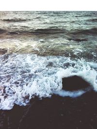 Waves splashing on rocks