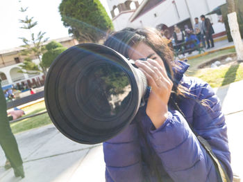 Portrait of man photographing