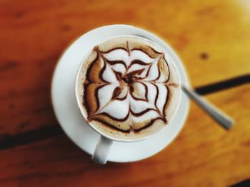 Close-up of cappuccino on table