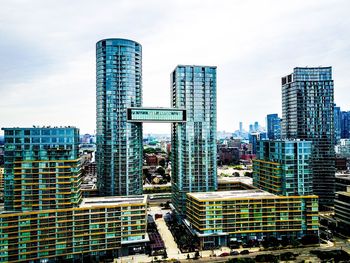 Modern cityscape against sky