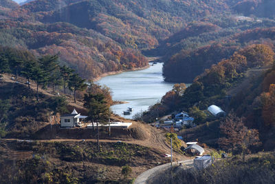 High angle view of lake amidst mountains