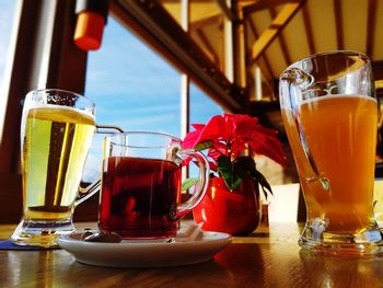 Close-up of beer glass on table