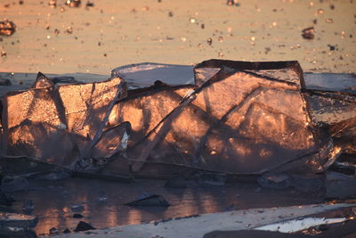 Close-up of illuminated  ice during sunset