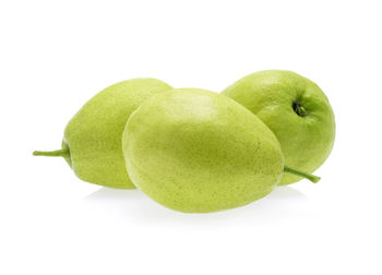 Close-up of fruit against white background