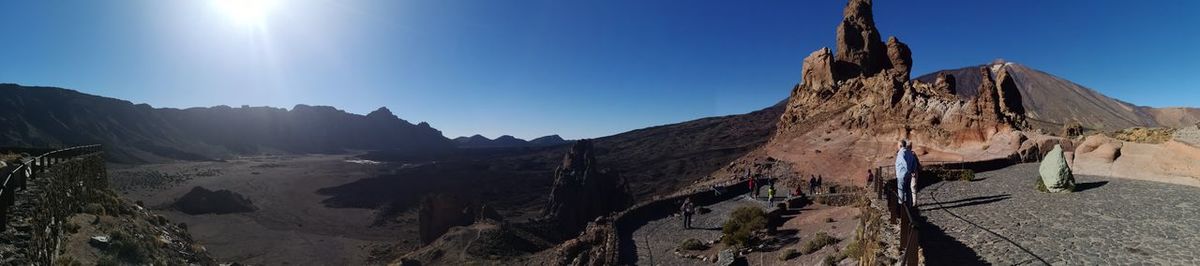 Panoramic view of mountains against clear sky